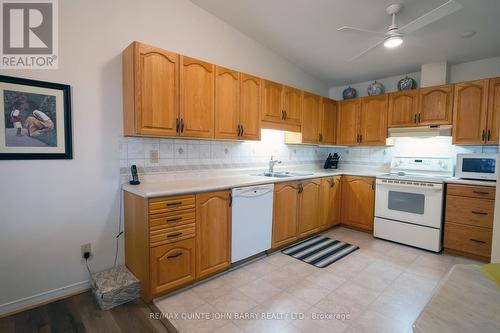 305 - 56 Tripp Boulevard, Quinte West, ON - Indoor Photo Showing Kitchen With Double Sink