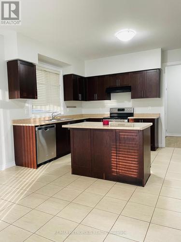 10 Barchard Street, Clarington, ON - Indoor Photo Showing Kitchen With Double Sink