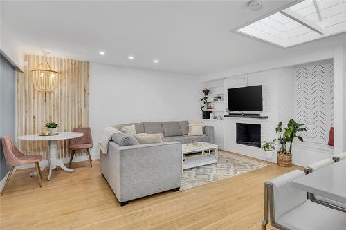 1361 Lambly Place, Kelowna, BC - Indoor Photo Showing Living Room With Fireplace