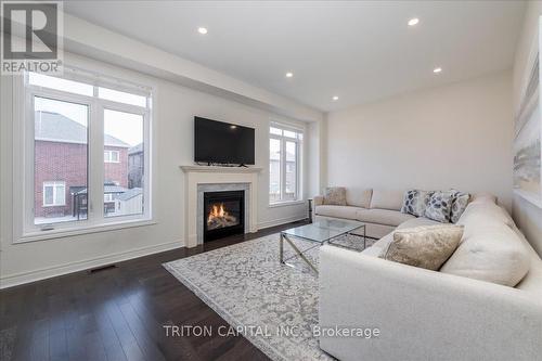 167 Inverness Way, Bradford West Gwillimbury, ON - Indoor Photo Showing Living Room With Fireplace