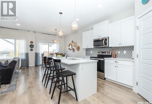 822 Childers Rise, Saskatoon, SK - Indoor Photo Showing Kitchen With Upgraded Kitchen