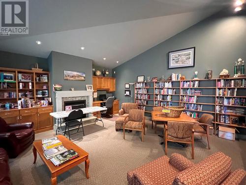 reading room - 2365 Stillingfleet Road Unit# 10, Kelowna, BC - Indoor Photo Showing Living Room With Fireplace