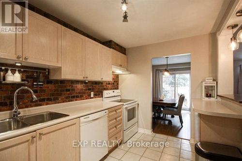 76 - 2670 Battleford Road, Mississauga, ON - Indoor Photo Showing Kitchen With Double Sink