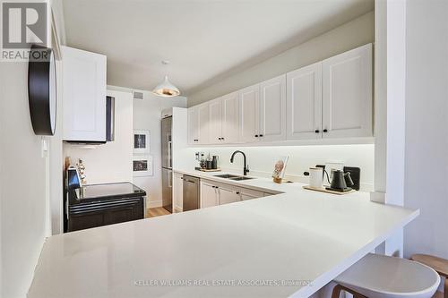 307 - 18A Hazelton Avenue, Toronto, ON - Indoor Photo Showing Kitchen With Double Sink