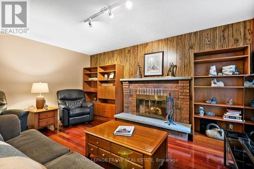 55 Goldberry Square, Toronto (Centennial Scarborough), ON - Indoor Photo Showing Living Room With Fireplace