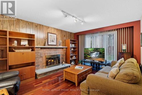 55 Goldberry Square, Toronto (Centennial Scarborough), ON - Indoor Photo Showing Living Room With Fireplace