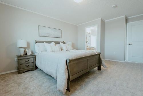 92 Prairie Oaks Drive, Mitchell, MB - Indoor Photo Showing Bedroom