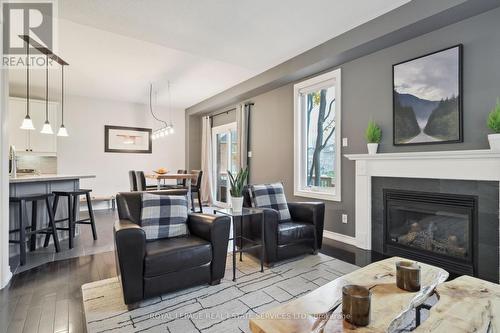 430 Black Drive, Milton, ON - Indoor Photo Showing Living Room With Fireplace