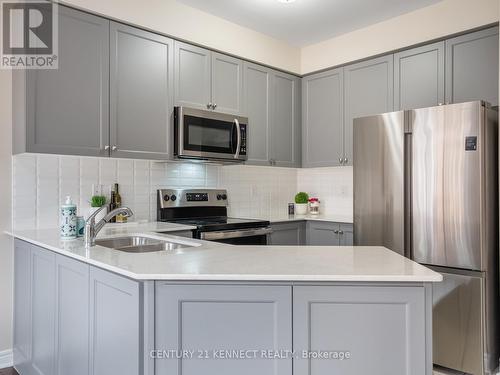 49 Finegan Circle, Brampton, ON - Indoor Photo Showing Kitchen With Double Sink With Upgraded Kitchen