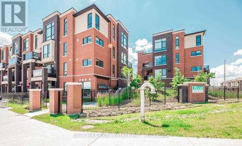 103 - 100 Dufay Road, Brampton, ON - Outdoor With Facade