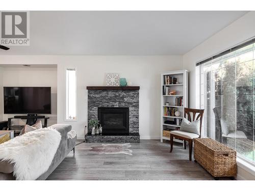 2440 Old Okanagan Highway Unit# 1204, West Kelowna, BC - Indoor Photo Showing Living Room With Fireplace