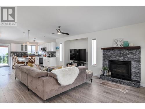 2440 Old Okanagan Highway Unit# 1204, West Kelowna, BC - Indoor Photo Showing Living Room With Fireplace