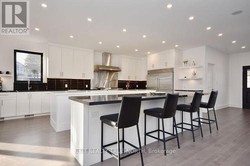 57 Glenhuron Drive, Springwater, ON - Indoor Photo Showing Kitchen With Upgraded Kitchen