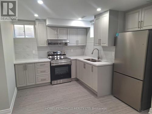 423 Edenbrook Hill Drive, Brampton, ON - Indoor Photo Showing Kitchen With Double Sink