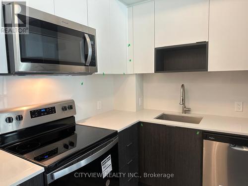 1003 - 204 Burnhamthorpe Road E, Mississauga, ON - Indoor Photo Showing Kitchen With Stainless Steel Kitchen