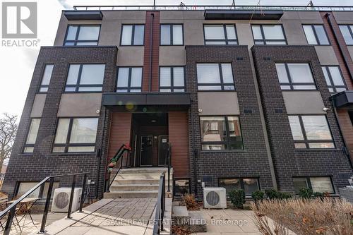 202 - 1150 Briar Hill Avenue, Toronto, ON - Outdoor With Facade