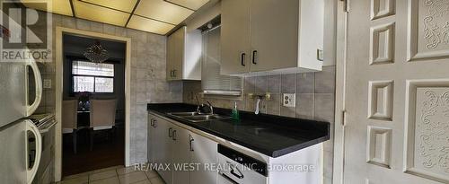 18 Richgrove Drive, Toronto, ON - Indoor Photo Showing Kitchen With Double Sink