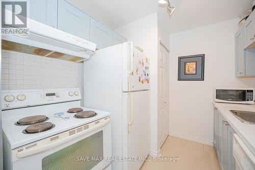 224 - 1450 Glen Abbey Gate, Oakville, ON - Indoor Photo Showing Kitchen