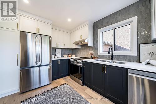 141 Speyside Drive, Oakville (1001 - Br Bronte), ON - Indoor Photo Showing Kitchen With Stainless Steel Kitchen With Double Sink