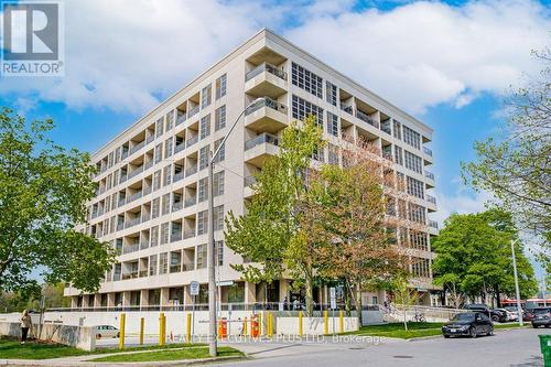 709 - 1 Leaside Park Drive, Toronto, ON - Outdoor With Balcony With Facade