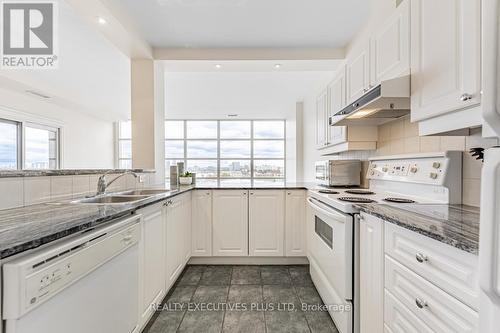 709 - 1 Leaside Park Drive, Toronto, ON - Indoor Photo Showing Kitchen With Double Sink