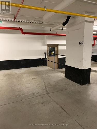 709 - 1 Leaside Park Drive, Toronto, ON - Indoor Photo Showing Garage