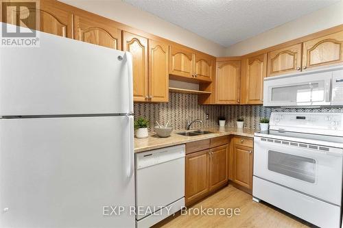 1205 - 55 William Street E, Oshawa, ON - Indoor Photo Showing Kitchen With Double Sink