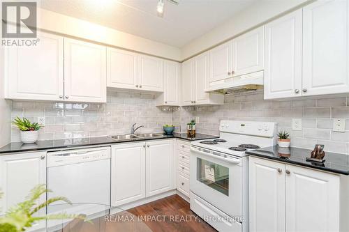 615 - 4600 Steeles Avenue E, Markham, ON - Indoor Photo Showing Kitchen With Double Sink