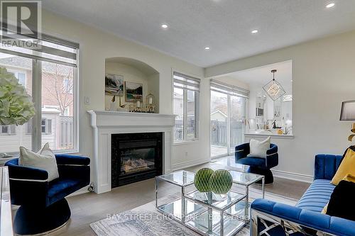 409 John Deisman Boulevard, Vaughan, ON - Indoor Photo Showing Living Room With Fireplace