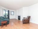 403-1560 Hillside Ave, Victoria, BC  - Indoor Photo Showing Living Room With Fireplace 