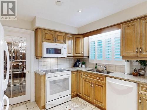 18 Courtsfield Crescent, Toronto, ON - Indoor Photo Showing Kitchen With Double Sink