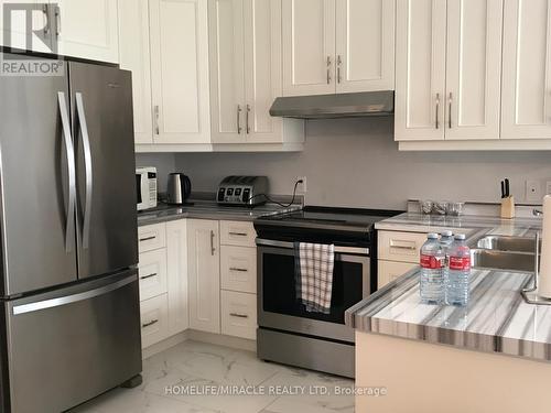 6739 Sam Lorfida Drive, Niagara Falls, ON - Indoor Photo Showing Kitchen With Double Sink