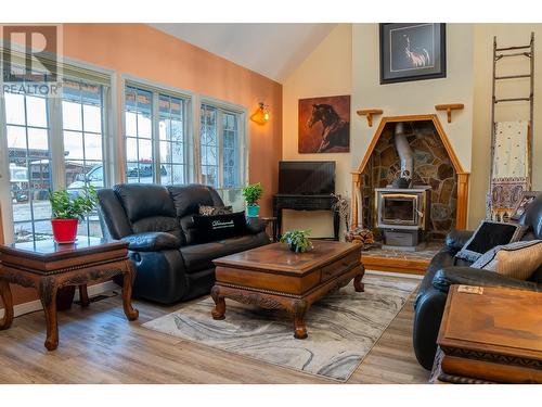 Main floor living area - 552 Wellspring Road, Creston, BC - Indoor Photo Showing Living Room With Fireplace