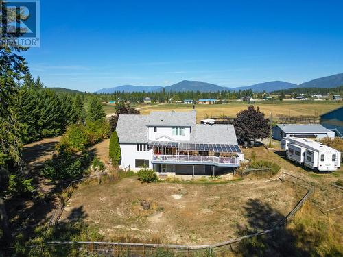 Fenced backyard - 552 Wellspring Road, Creston, BC - Outdoor With Deck Patio Veranda With View