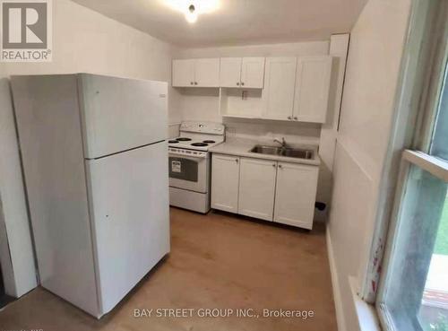 Upper - 5114 Mcrae Street, Niagara Falls, ON - Indoor Photo Showing Kitchen With Double Sink