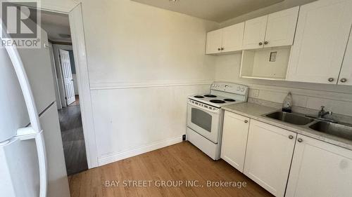 Upper - 5114 Mcrae Street, Niagara Falls, ON - Indoor Photo Showing Kitchen With Double Sink