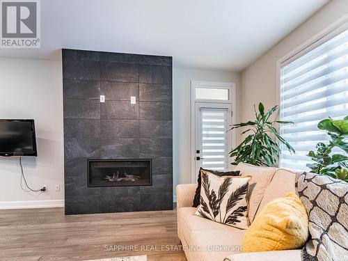 3931 Mitchell Crescent, Niagara Falls, ON - Indoor Photo Showing Living Room With Fireplace