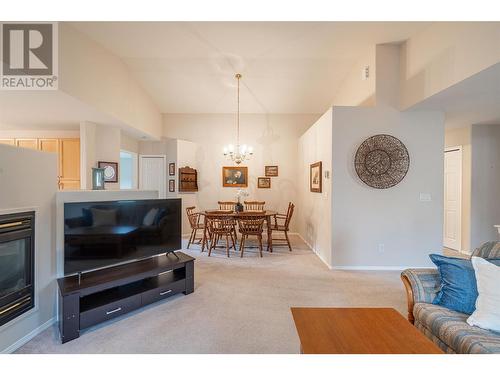 5888 Okanagan Landing Road Unit# 18, Vernon, BC - Indoor Photo Showing Living Room With Fireplace