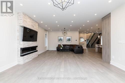 53 Culnan Avenue E, Toronto, ON - Indoor Photo Showing Living Room With Fireplace