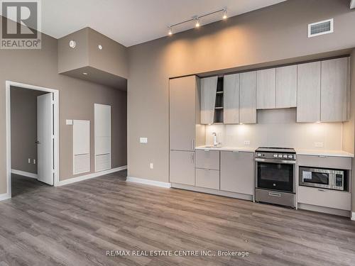 5907 - 3883 Quartz Road N, Mississauga, ON - Indoor Photo Showing Kitchen