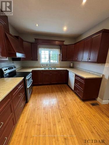 1632 2 & 3 Concession, Cochrane, ON - Indoor Photo Showing Kitchen With Double Sink