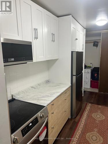 716 - 370 Dixon Road, Toronto, ON - Indoor Photo Showing Kitchen