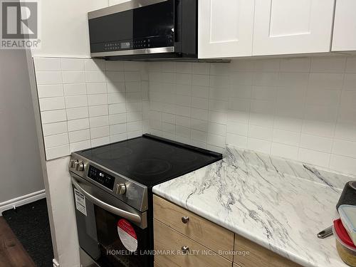 716 - 370 Dixon Road, Toronto, ON - Indoor Photo Showing Kitchen