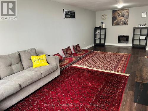 716 - 370 Dixon Road, Toronto, ON - Indoor Photo Showing Living Room With Fireplace