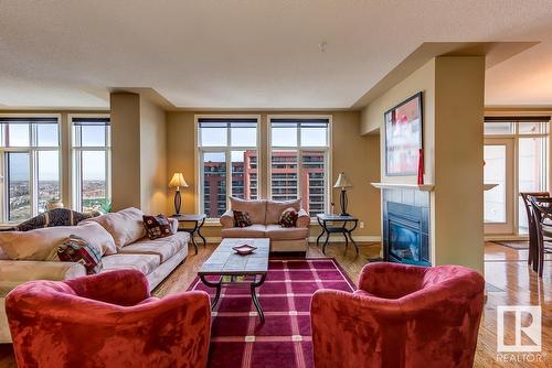 #1701 9020 Jasper Av Nw, Edmonton, AB - Indoor Photo Showing Living Room With Fireplace