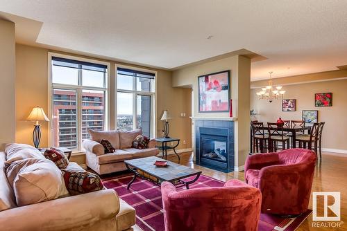 #1701 9020 Jasper Av Nw, Edmonton, AB - Indoor Photo Showing Living Room With Fireplace