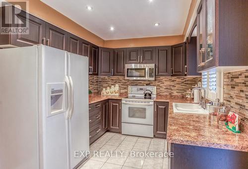 58 Reed Drive, Ajax (Central), ON - Indoor Photo Showing Kitchen With Double Sink