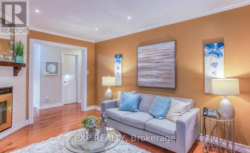 58 Reed Drive, Ajax (Central), ON - Indoor Photo Showing Living Room With Fireplace