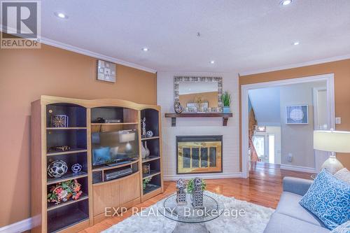 58 Reed Drive, Ajax (Central), ON - Indoor Photo Showing Living Room With Fireplace