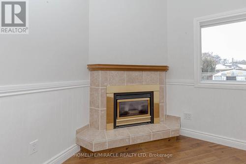 19 Niagara Road, Kitchener, ON - Indoor Photo Showing Living Room With Fireplace